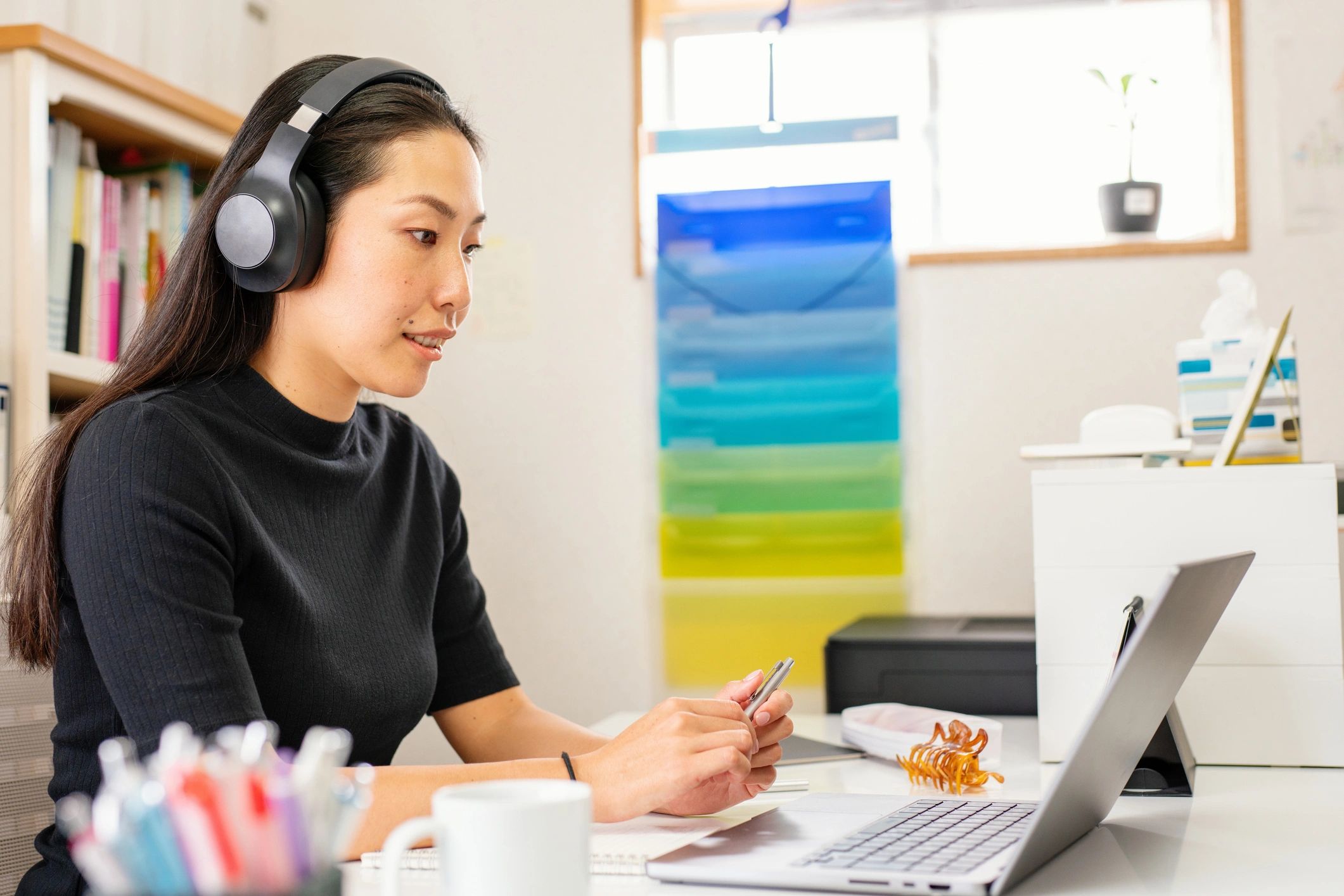 Mid adult woman taking online lessons